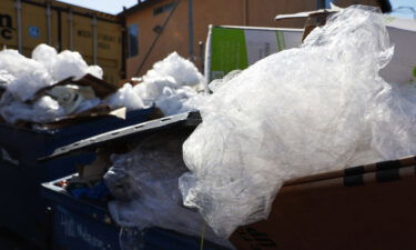 Discarded plastic and other debris overflow from a Los Angeles trash bin. Surfrider Foundation reports less than 7% of plastic gets recycled in the US.