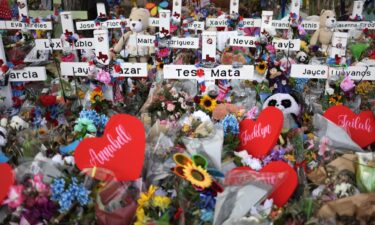 Wooden crosses are placed at a memorial dedicated to the victims of the mass shooting at Robb Elementary School on June 3