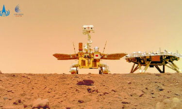 This image showing the rover and the lander on the surface of Mars was taken by a separable camera deployed by the Zhurong rover in 2021.