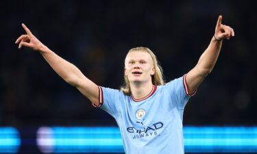 Erling Haaland of Manchester City celebrates after scoring the team's fourth goal during the Premier League match between Manchester City and Arsenal FC at Etihad Stadium on April 26 in Manchester