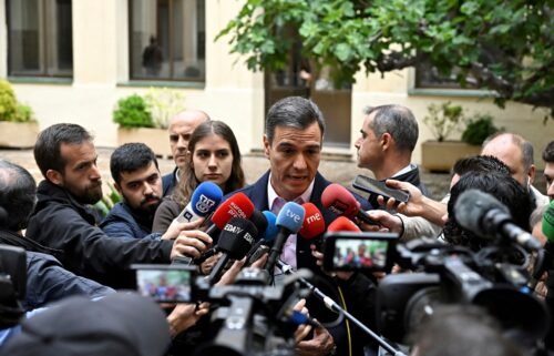 Spain's Prime minister Pedro Sanchez of Socialist Party (PSOE) talks to media after voting in Madrid on May 28
