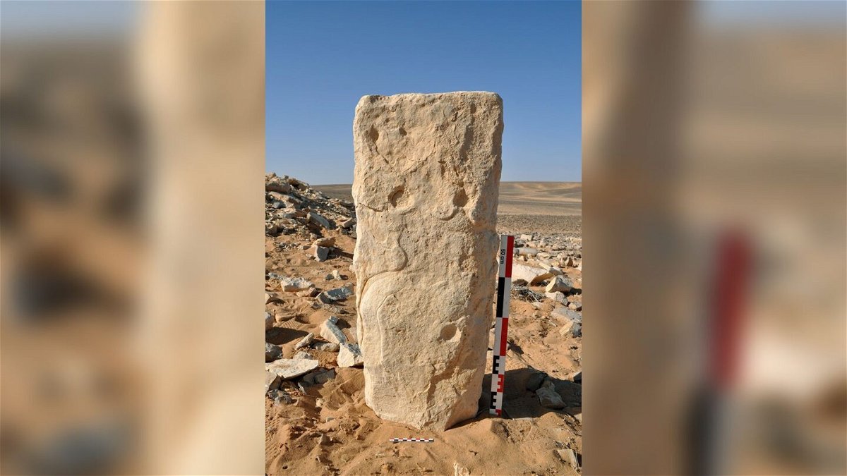 <i>SEBAP & Crassard et al. 2023 PLOS ONE</i><br/>The engraved stone is shown at the JKSH F15 site in Jibal al-Khashabiyeh in Jordan. The monolith was found lying down and was set vertically for the photograph.