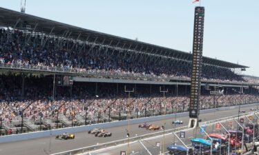 View of fans in the stands during race at Indianapolis Motor Speedway.