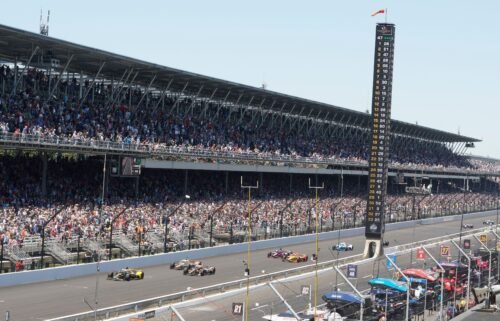 View of fans in the stands during race at Indianapolis Motor Speedway.
