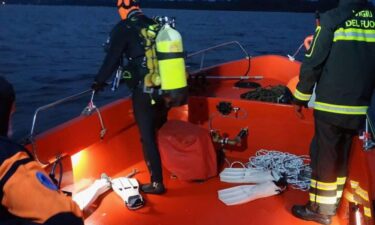 A diver searches for bodies after  a rescue operation in Lake Maggiore