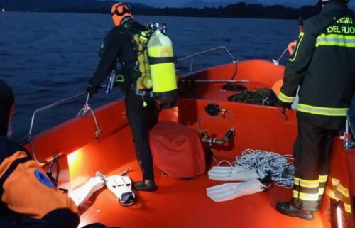A diver searches for bodies after  a rescue operation in Lake Maggiore