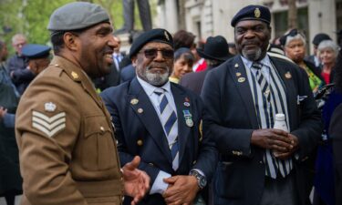 Serving and former military personnel queued to attend Brown's funeral on May 25.