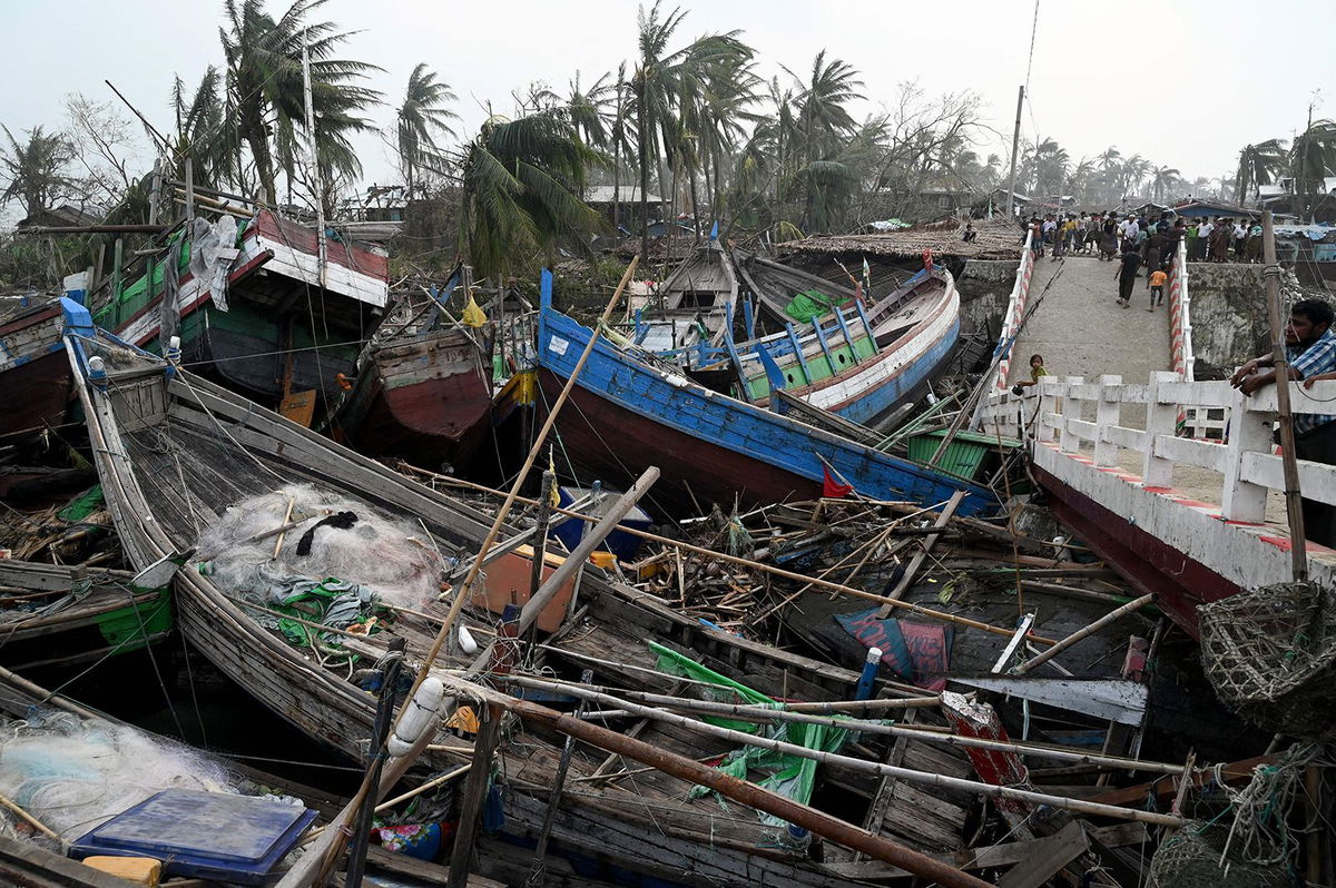 <i>Sai Aung Main/AFP/Getty Images</i><br/>Smashed-up boats are piled up next to a broken bridge in Sittwe