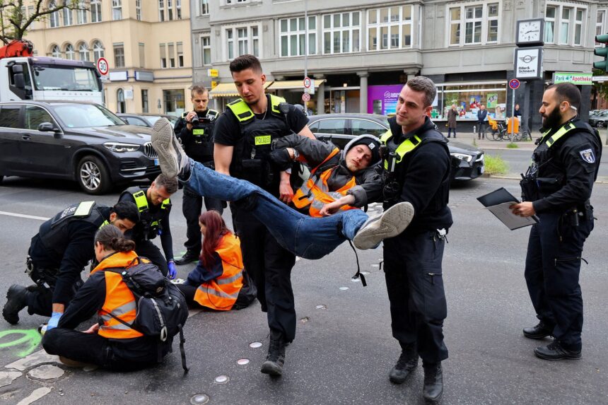 German police conduct raids on climate activists as impatience mounts