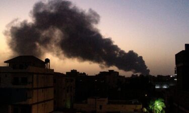 Smoke rises above buildings in southern Khartoum on May 19 as violence between two rival Sudanese generals continues.