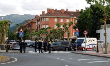 Police cordon off the area where a man and a woman died in a suspected bomb blast in Orio