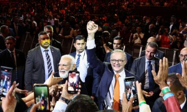 India's Prime Minister Narendra Modi and his Australian counterpart Anthony Albanese attend an event with members of the local Indian community at the Qudos Arena in Sydney on May 23.