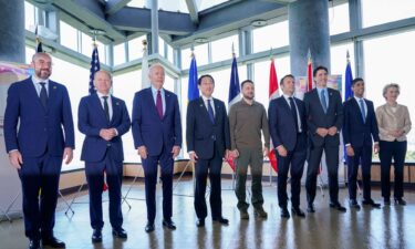 G7 leaders and Ukrainian President Volodymyr Zelensky pose for a photo before a working session on Ukraine during the G7 Summit in Hiroshima