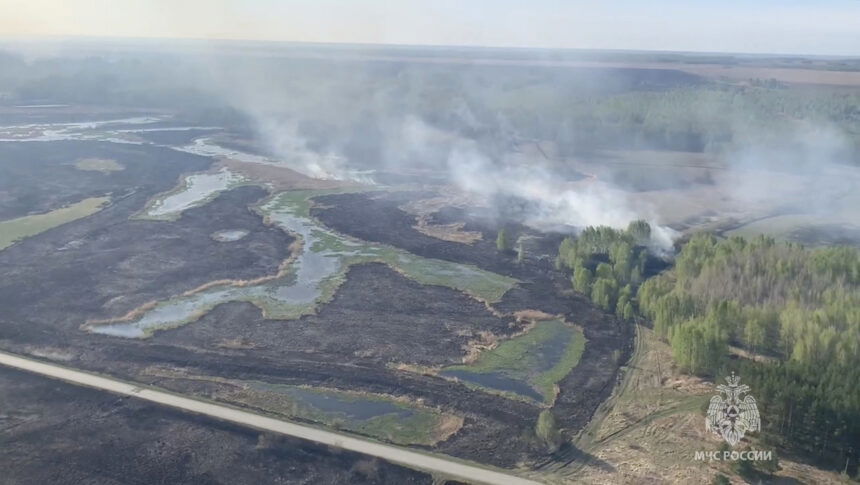 <i>Russian Emergencies Ministry/Reuters</i><br/>Smoke rising from a wildfire in the Kurgan Region