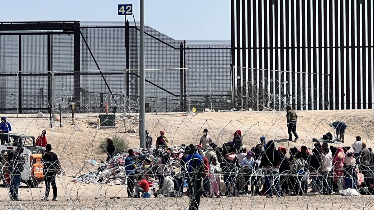 Migrants camping by the border wall wait for lifting of Title 42; more ...