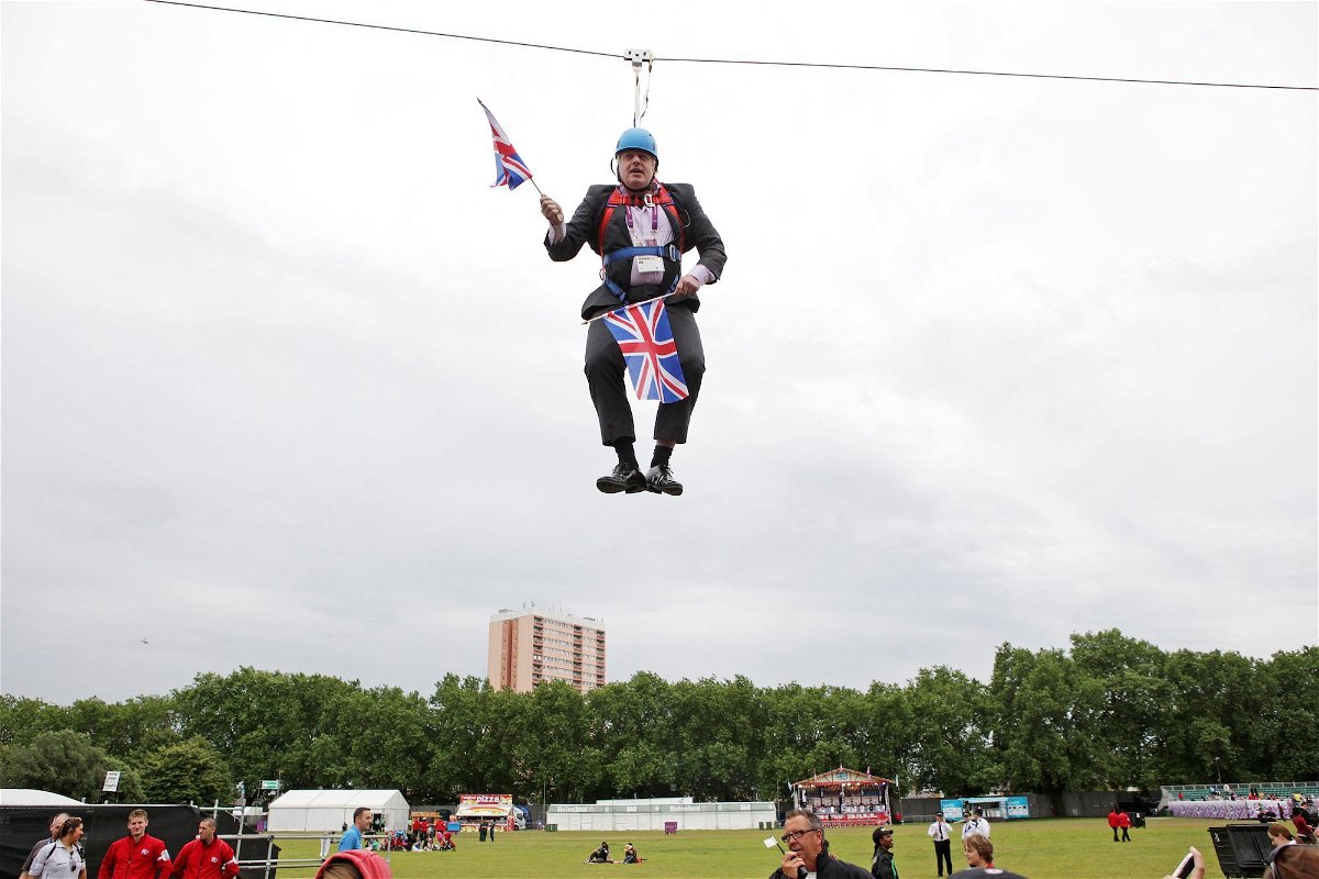 <i>Kois Miah/Getty Images</i><br/>Boris Johnson gets stuck on a zip-line in Victoria Park in London where the 2012 Olympic Games were being shown on a big screen on August 1