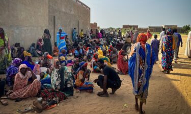 Sudanese refugees gather as Doctors Without Borders (MSF) teams assist the war wounded from West Darfur