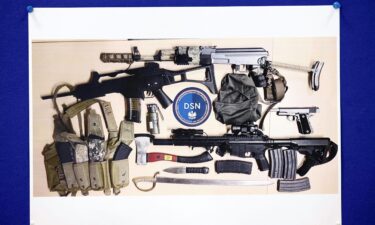 An image of the weapons confiscated is shown during the press conference.