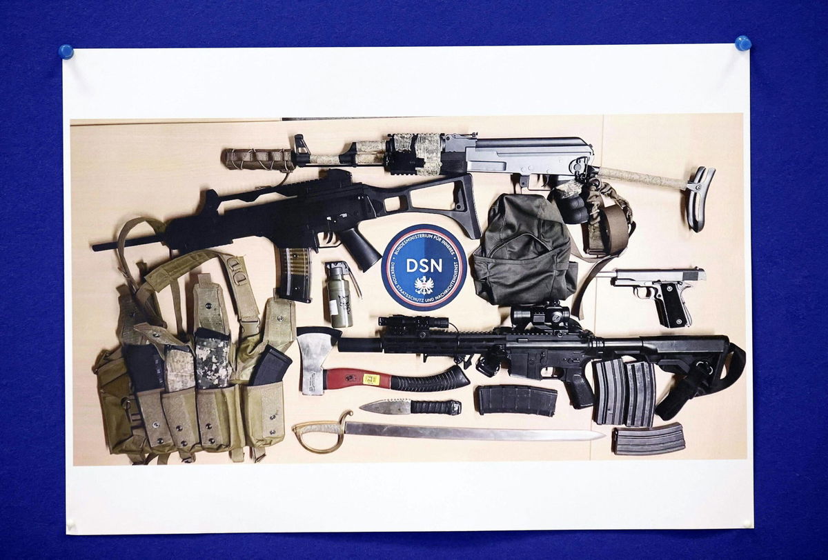 <i>Tobias Steinmaurer/APA/AFP/Getty Images</i><br/>An image of the weapons confiscated is shown during the press conference.