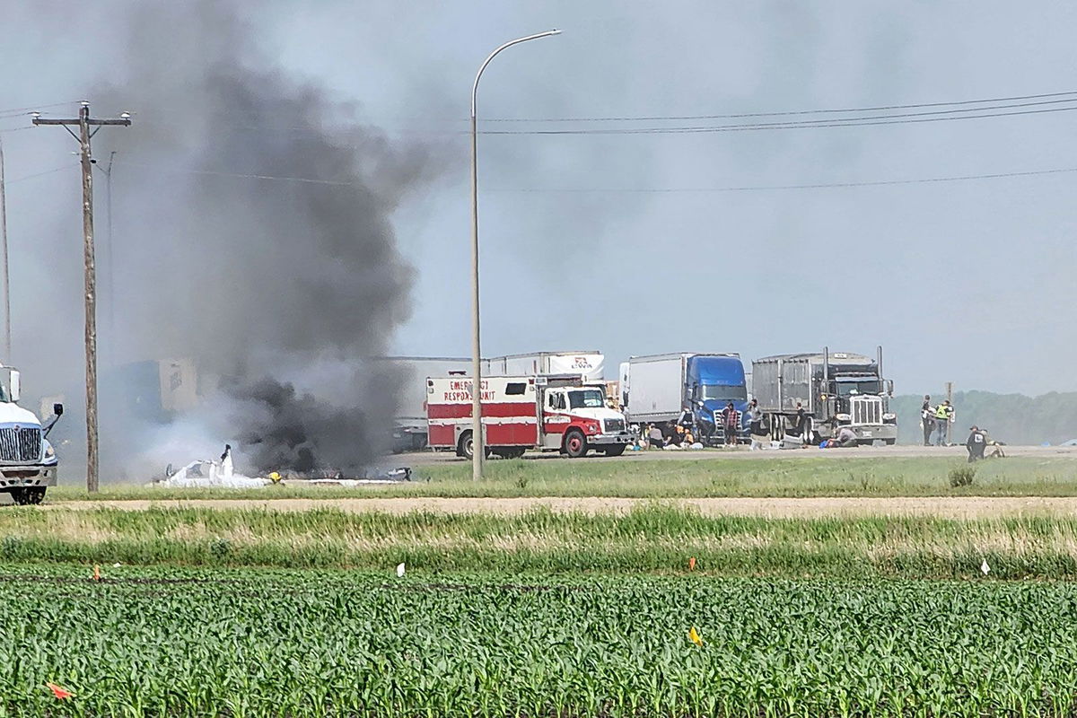 <i>Nirmesh Vadera/AFP/Getty Images</i><br/>First responders are pictured following the deadly road accident near Carberry