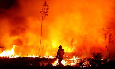 A firefighter creates a tactical fire in Louchats