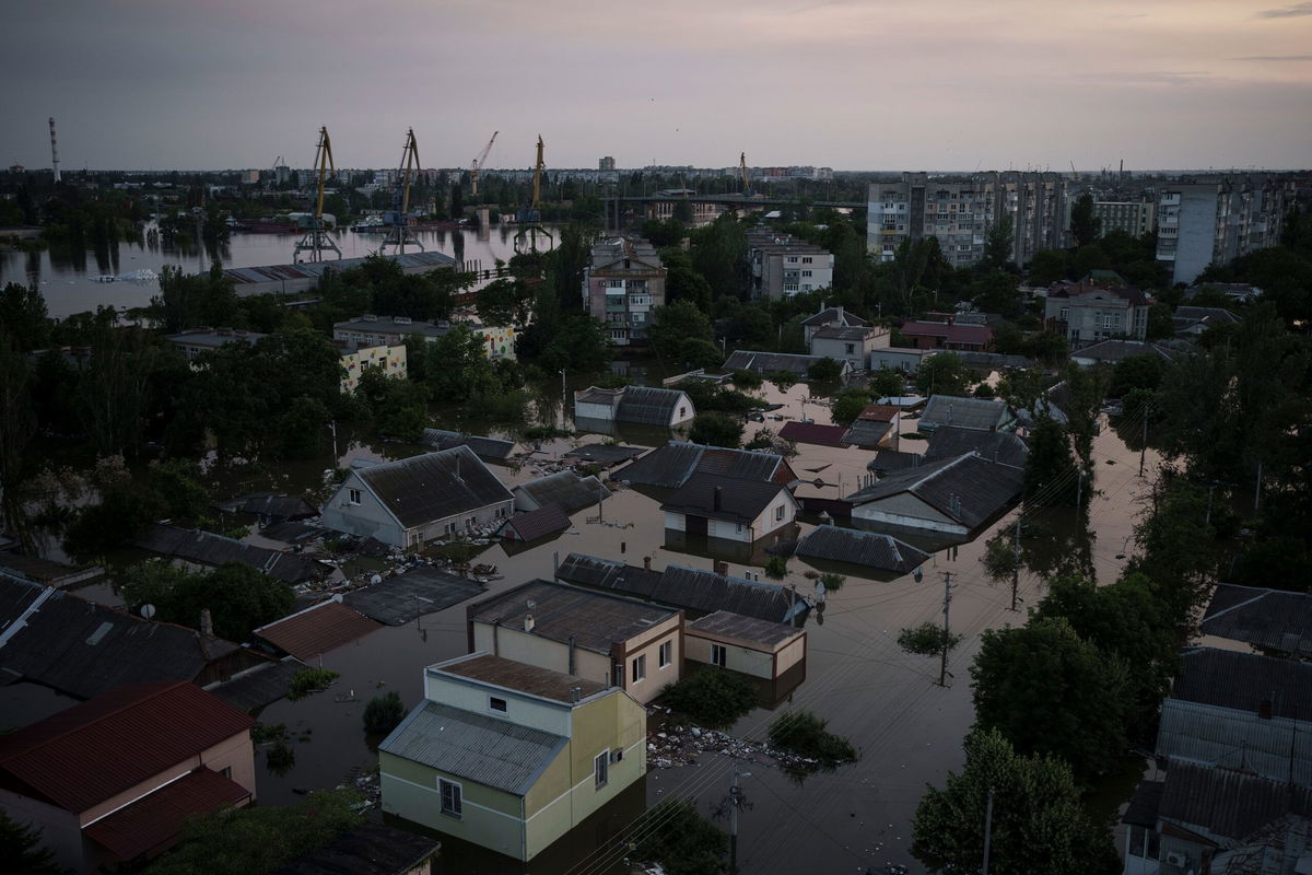 <i>Felipe Dana/AP</i><br/>Flooded homes in Kherson