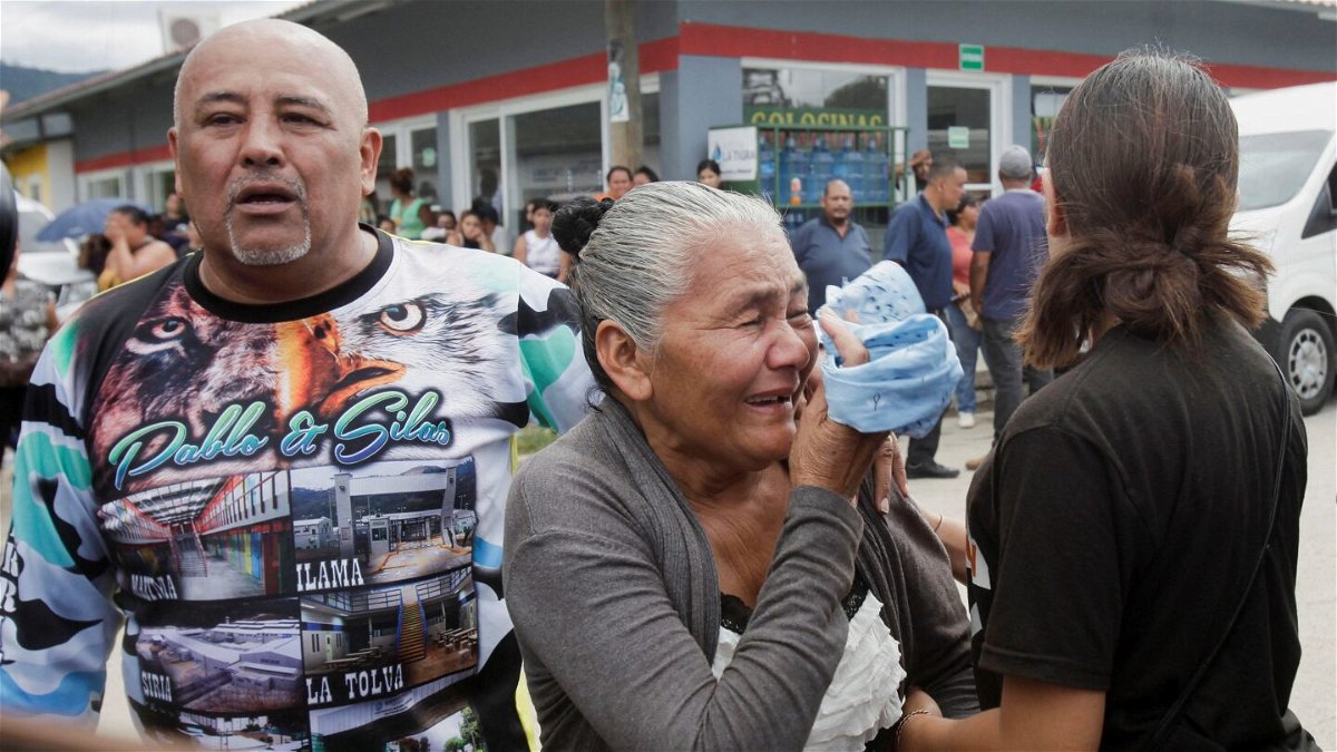 <i>Fredy Rodriguez/Reuters</i><br/>Relatives of inmates react as they wait for news about their loved ones outside the Centro Femenino de Adaptacion Social women's prison on June 20.