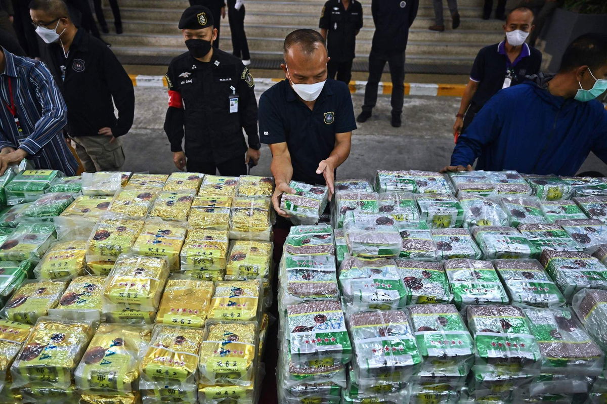 <i>Lillian Suwanrumpha/AFP/Getty Images/FILE</i><br/>Thai police display packages of seized crystal methamphetamine in Bangkok on January 24.