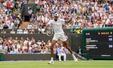 Christopher Eubanks’ plays a backhand volley against Medvedev.