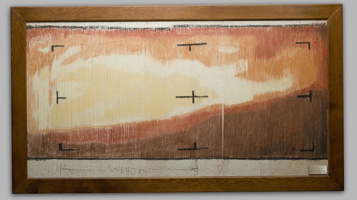 <i>Dan Goods/NASA/JPL-Caltech</i><br/>The hand-colored version of the Mariner 4 image is part of an exhibit at NASA's Jet Propulsion Laboratory in Pasadena