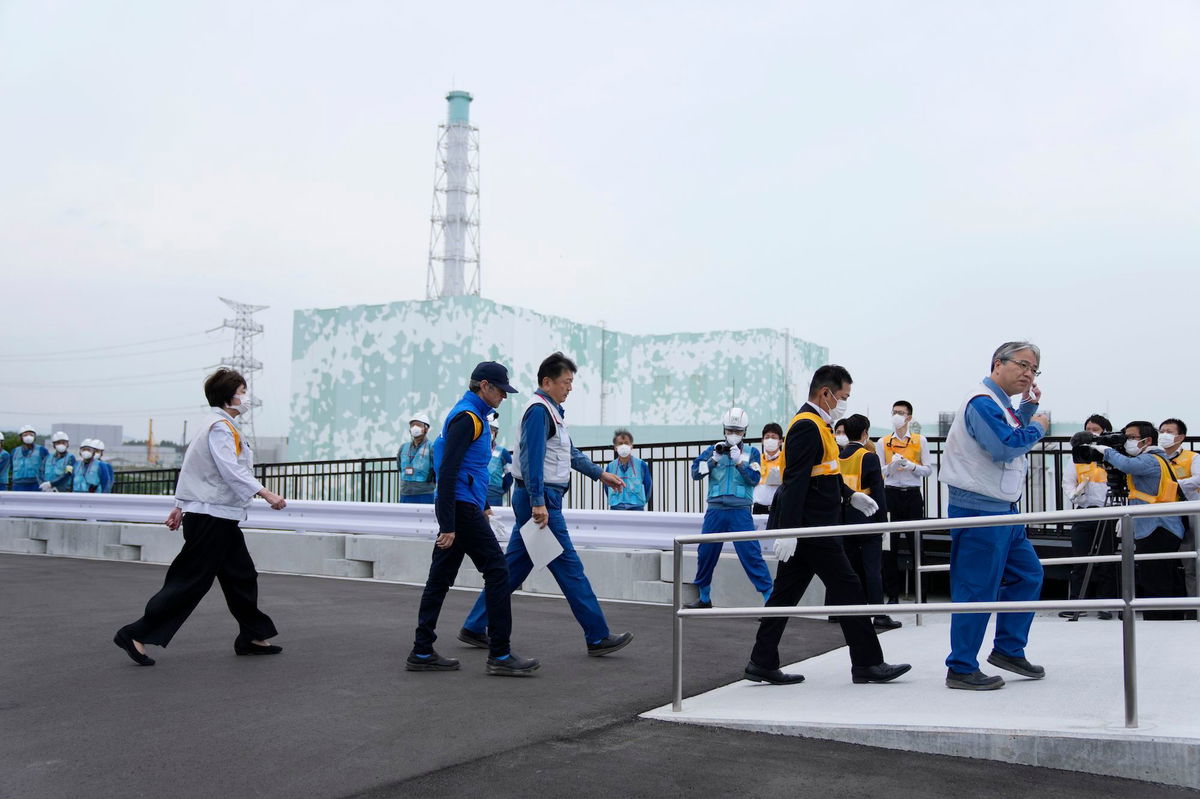 <i>Hiro Komae/Pool/AP</i><br/>IAEA chief Rafael Grossi arrives to inspect the damaged Fukushima nuclear power plant with Japanese officials on July 5