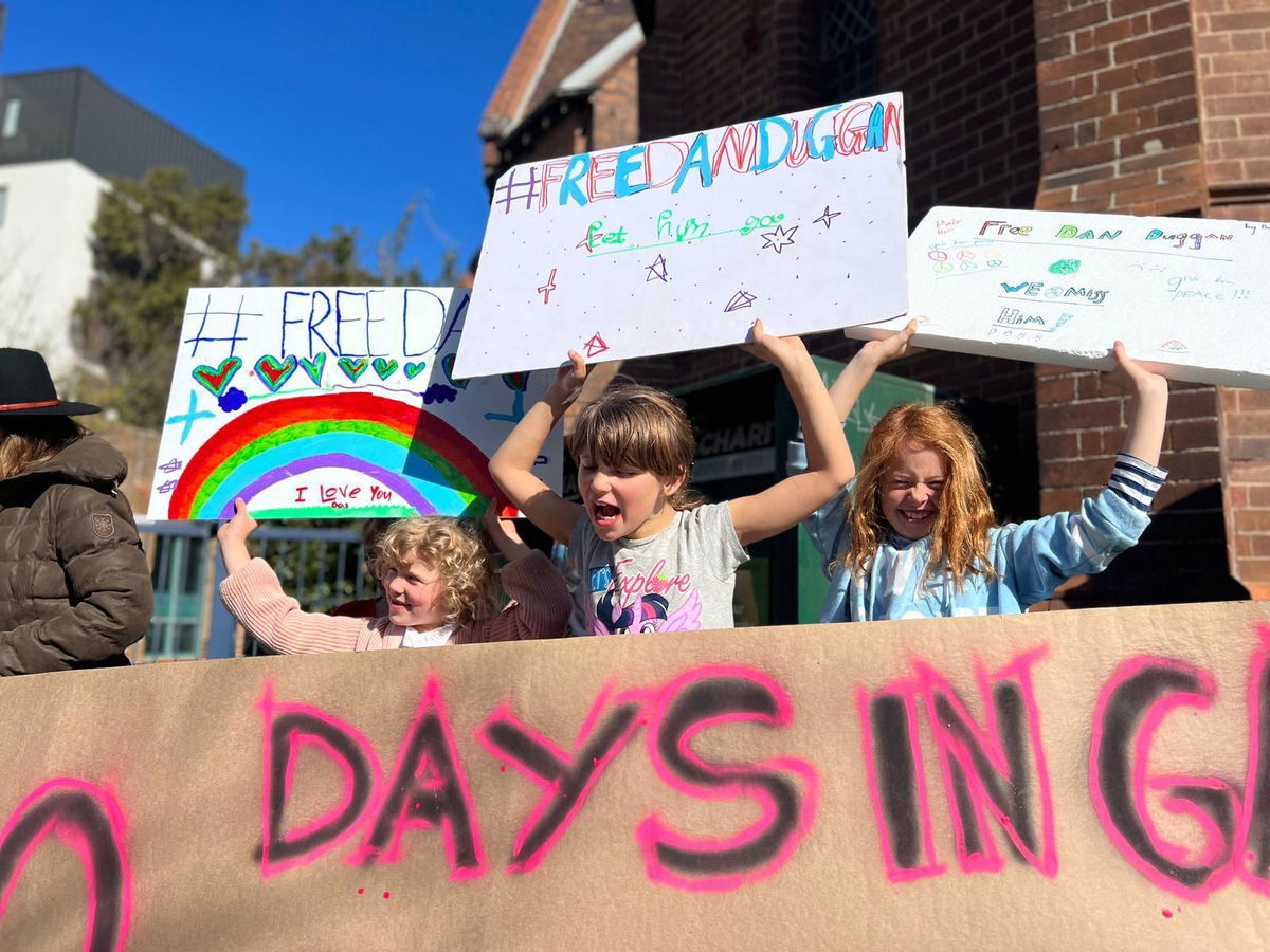 <i>Paul Devitt/CNN</i><br/>Daniel Duggan's children joined protesters on July 23 to call for their father's release.