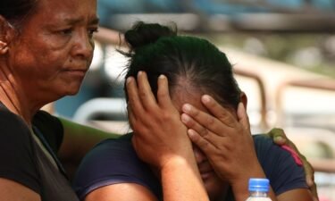 Relatives of prisoners at a penitentiary in Ecuador learn about the fatal clashes in Guayaquil on Tuesday