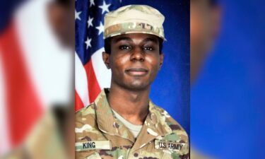 This family photo shows a portrait of American soldier Travis King displayed at the home of his grandfather Carl Gates