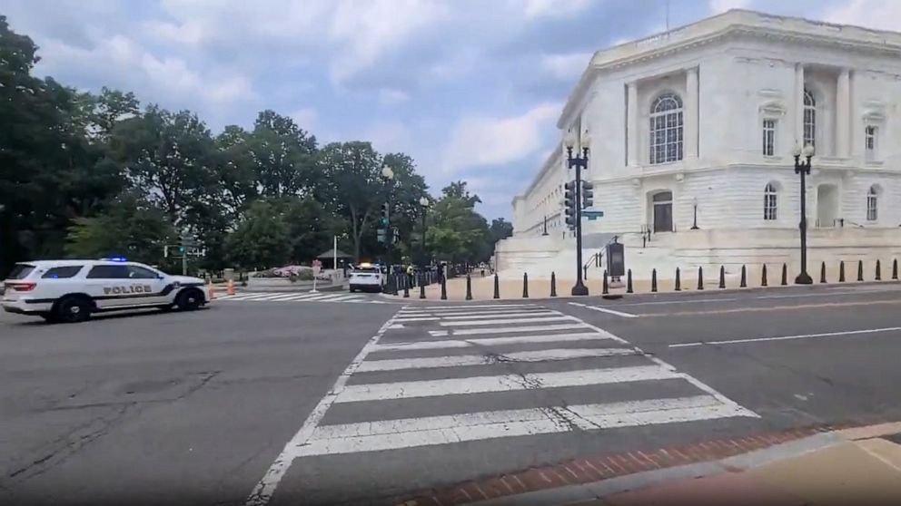 In this still from a video, law enforcement officers arrive on the scene at the Russell Office Building in Washington, D.C., on Aug. 2, 2023.