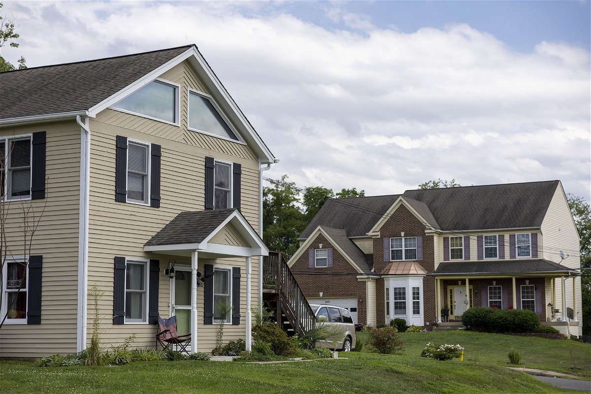 Single-family homes with ample yards are seen in Dumfries, Virginia, on August 13. US mortgage rates surged to their highest level in nearly 23 years this week as inflation pressures persisted.