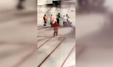 Police responded to a disturbance on plane in New Orleans when a passenger climbed on to a plane's wing at New Orleans Louis Armstrong International Airport.