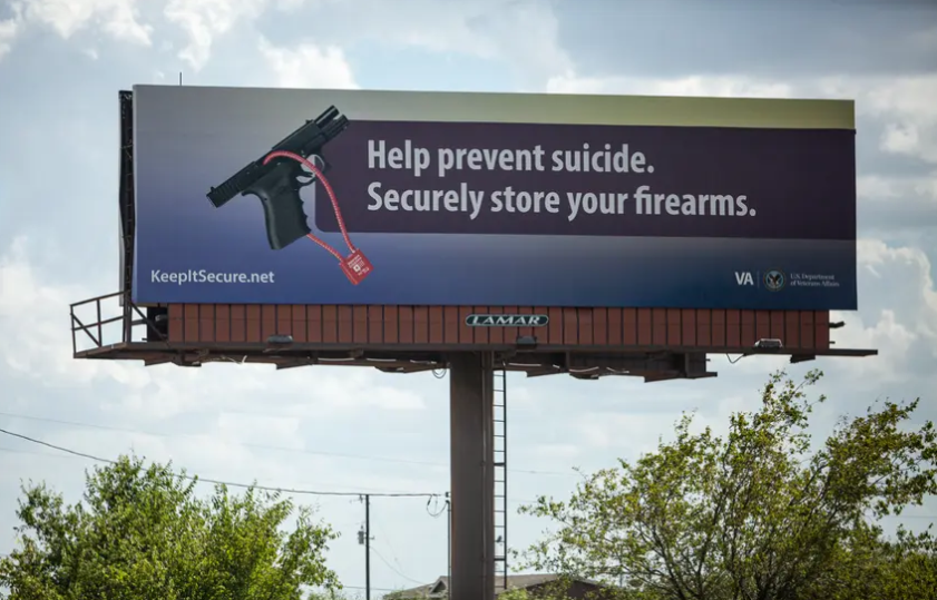 A billboard about firearm safety is displayed off Highway 130 outside Austin, TX.