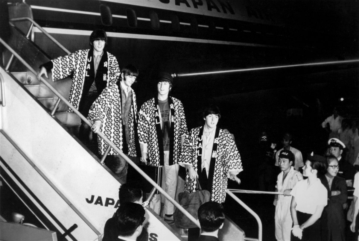 The Beatles arrive at Tokyo's airport for their brief tour of Japan in 1966.