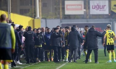 İstanbulspor players leave the field after their president Ecmel Faik Sarıalioğlu called them off the pitch in protest of not getting penalty.