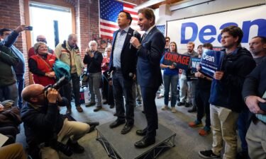 2020 Democratic presidential candidate Andrew Yang has endorsed Rep. Dean Phillips’ bid for president. Both are seen here in Manchester