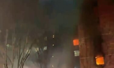 Firefighters battled a large fire at a Brooklyn apartment building Sunday night.