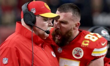 Travis Kelce confronts Andy Reid in the first half of Super Bowl LVIII.