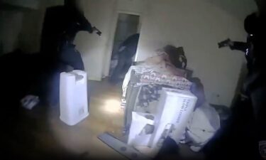 An image taken from body camera video shows the moments police in Illinois shot and killed a man inside his apartment bedroom.