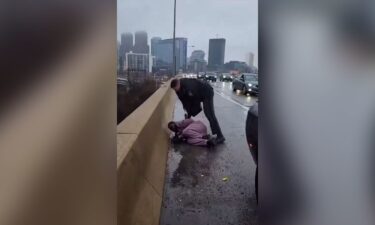 A still from a video shows a Pennsylvania state trooper detaining Darius McLean