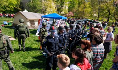 Indiana State Police confront pro-Palestinian protesters at Indiana University in Bloomington on April 25.