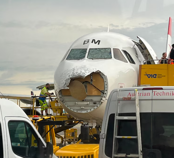 Damage is seen on an Austrian Airlines airplane in Vienna
