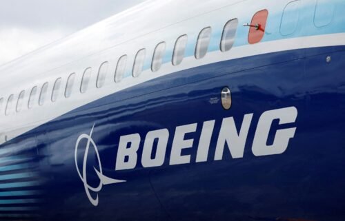 The Boeing logo is seen on the side of a Boeing 737 MAX at the Farnborough International Airshow in this 2022 file photo.
