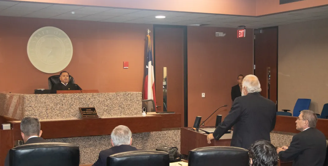 Defense attorney Joe Spencer, standing, addresses 409th District Judge Sam Medrano Jr. during a hearing on Oct. 11, 2022.