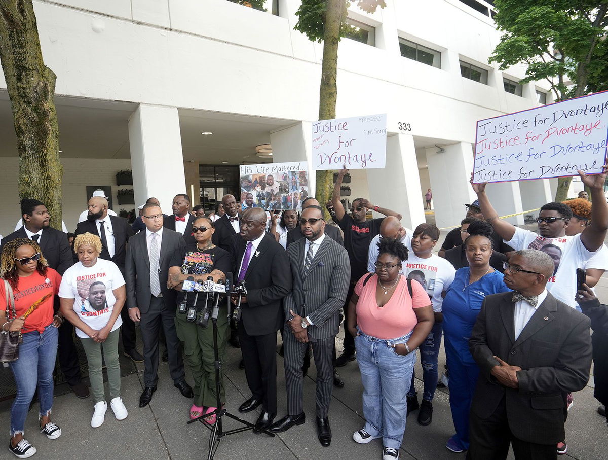 <i>Ebony Cox/Milwaukee Journal Sentinel/USA Today Network via CNN Newsource</i><br/>DeAsia Harmon is seen to the left of attorney Ben Crump